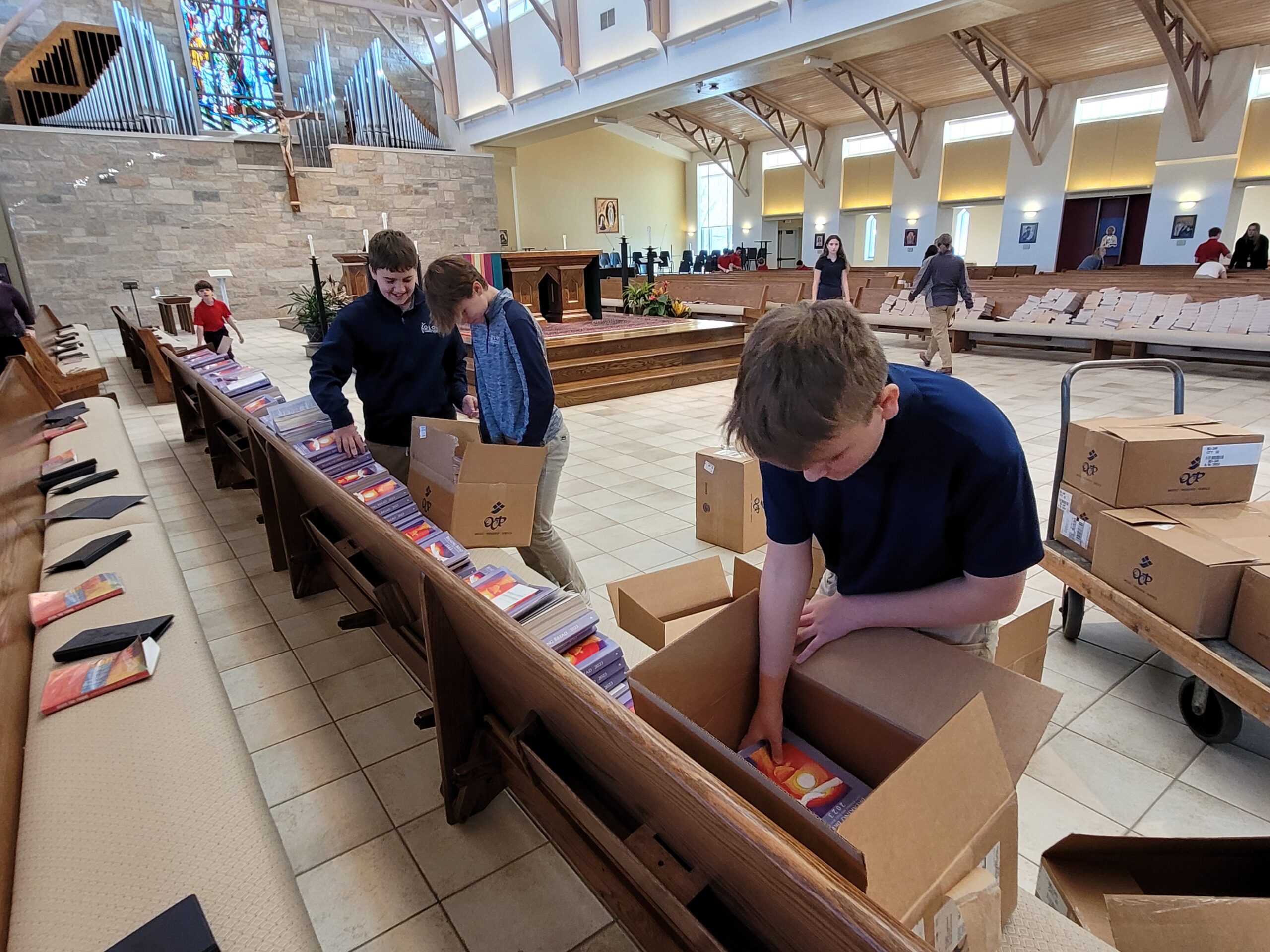 Our Lady of Lourdes Catholic School students pack books